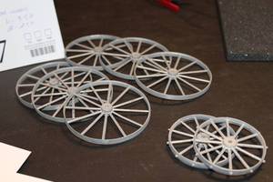 lot 277 image: Lot of (8) Steel Wagon Wheel Replicas