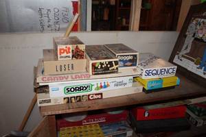 lot 1827 image: Lot of (7) Board Games - Pit, Loser, Candy Land, Sorry, Clue, Boggle, Scrabble, Sequence, Yahtzee