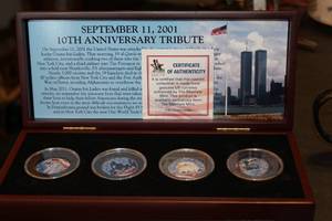 lot 289 image: 911 Anniversary Tribute with Four Coins and One Gold Plated Postage Stamp