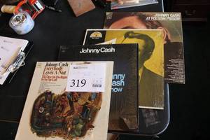 lot 319 image: Lot of (4) 12,33-13rpm Johnny Cash Vinyl Records - Everybody Loves A Nut, At Folsom Priosn,  Johnny Cash Show, Johnny Cash Hits