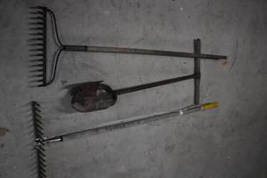 Rakes and posthole digger