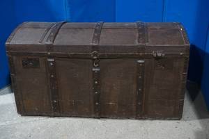 large antique rounded top trunk