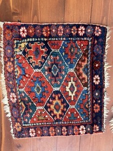 Two Small Decorative Rug Pieces