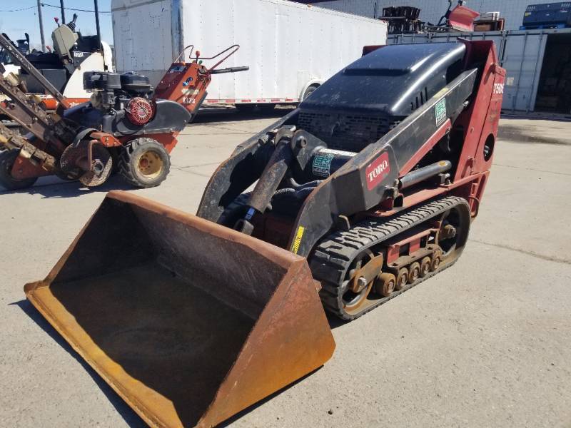 Toro Dingo Unleaded Gas Compact Utility Loader with Bucket Attachment