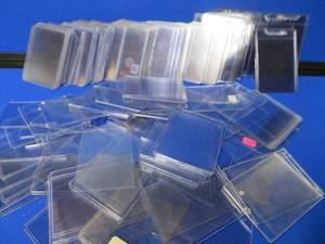 lot 32 image: CLEAR PLASTIC CARD SLEEVES