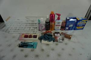 lot 160 image: Metal Organizer with Assorted Personal Care Items