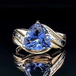 lot 38 image: Statement Stunner Purple Trillion Simulated Tanzanite & Diamond Cocktail Ring in Yellow Gold VIDEO