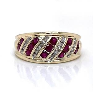 lot 62 image: Stunning Decadence Natural Ruby & Diamond Channel Dome Shaped Cocktail Estate Ring in Yellow Gold