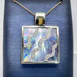 lot 13 image: Upscale Cascading Ocean Wave 0.20cts Diamond & Mother of Pearl Vacation Estate Pendant in 14k Yellow Gold $2800 Retail VIDEO