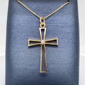 lot 53 image: Illuminating Diamond Solitaire Celtic Cross Open Frame Pendant in 14k Yellow Gol