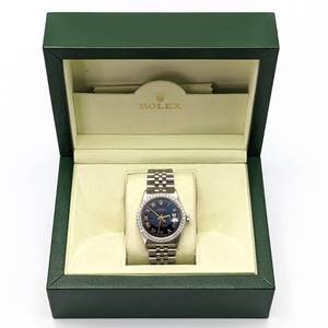 lot 7A image: Rolex Date 34mm Model 1505 Timepiece with 1.32 Carat Natural Diamond Bezel, James Cameron Style Blue Dial, Stainless Steel with Box