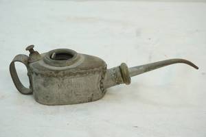 lot 26 image: antique Kayes machine oil can