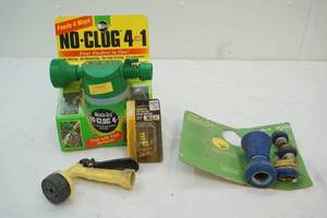 lot 86 image: Miracle Grow feeder and Nelson watering set