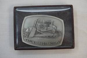 lot 184 image: Cat N Series Tractors belt buckle