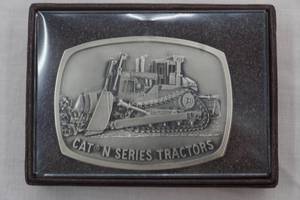 lot 185 image: Cat N Series Tractors belt buckle