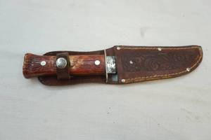 lot 279 image: Imperial knife in leather sheath