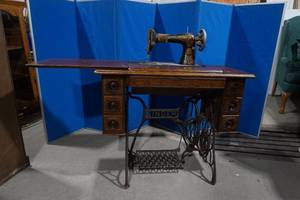 lot 384 image: antique Singer sewing machine with carved wood