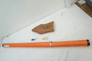 lot 405 image: fishing pole travel case, reel cover and fishing lures