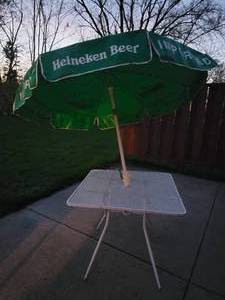 Vintage Metal Patio Table with Heineken Umbrella