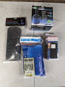 lot 705 image: New Aquarium Pump and Filter Inserts Lifegard Quiet One Aquarium Pump 87 GPH, Marineland 2-in-1 Biofoam & Prefilter, Aquatop Replacement Carbon Inserts and Marineland Magnum Internal Canister Filter