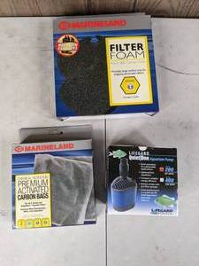 lot 709 image: New Aquarium Pump and Filters Lifegard Quiet One Aquarium Pump 87 GPH, Marineland Filter Foam and Marineland Premium Carbon Bags