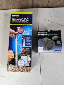 lot 710 image: New Aquarium Pump and GravelVAC Life Gard Quiet One Aquarium Pump 240 GPH and Fluval GravelVAC Multi-Surface Substrate Cleaner
