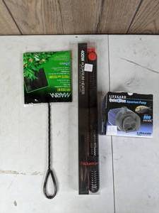 lot 711 image: New Aquarium Pump, Heater and Net Lifegard Quiet One Aquarium Pump 240 GPH, Aquatop 400W Aquarium Heater and Marina Easy Catch 6 Net