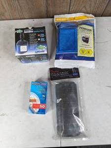 lot 703 image: New Aquarium Pump and Inserts 20-50 Gal. Aquaclear Filter Insert BioMax, Aquatop Replacement Carbon Inserts, Bio-Wheel Penguin Power Filter Cartridges and Lifegard Quiet One Aquarium Pump 87 GPH