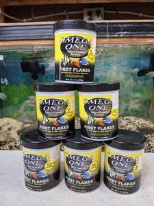lot 450 image: New Set of (6) 1oz Omega One First Flakes for Fish New to your Aquarium