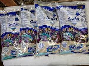 lot 336 image: CaribSea Live Aragonite Reef Sand - Four 20 lb bags
