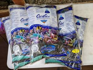 lot 337 image: CaribSea Live Aragonite Reef Sand - Five 20 lb bags