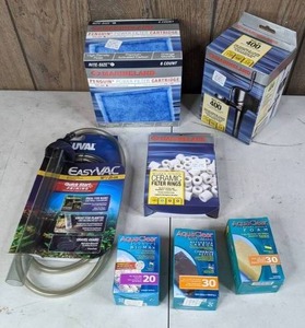 lot 383 image: NEW 7 Piece Lot of Marineland Maxi Jet 400 Pump, EasyVac, Various Filters and Ceramic Filter Rings