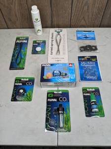 lot 511 image: New Aquarium Supplies  Fluval Nitrate Test, Aquavitro Curved Spring Shears, Fluval Spring Scissors, & More