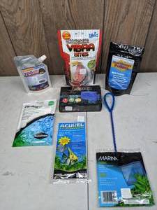 lot 466 image: New Aquarium Supplies Marina Fish Net, Acurel Filter Lifeguard Media Bag, Aqua Breza Battery Powered Aquarium Air Pump, & More