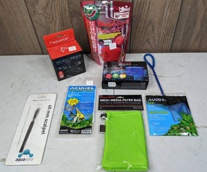 lot 469 image: New Aquarium Supplies Marina Fish Net, Acurel Filter Lifeguard Media Bag, Aqua Breza Battery Powered Aquarium Air Pump, & More
