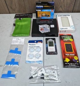 lot 472 image: New Aquarium Supplies Fluval Ammonia Test Kit, Aquatop Dual Digital Aquarium Thermometer, Aquatop Nursery Box, & More