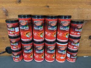 lot 686 image: New Set of (14) Omega One Small Super Color Pellets (8) 6.5oz Floating and (6) 4.2oz Sinking