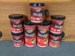 lot 688 image: New Set of (7) Omega One Small Super Color Pellets (2) 6.5oz Floating and (5) 4.2oz Sinking