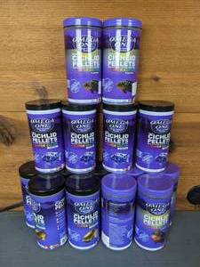 lot 689 image: New Set of (15) Floating and Sinking Omega One Cichlid Pellets Super Color in Small(8oz), Medium(6.5oz) and Large(9oz)
