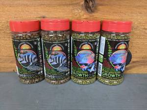 lot 693 image: New Set of (4) 9oz Southern Delight Vegi-Tail Powerfeed and Growth Pellets