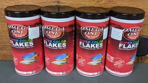 lot 648 image: NEW 4 Containers Omega One Super Color Flakes, 2.2 oz. Size