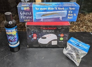lot 498 image: New Aquarium Supplies Aquatop Breza Fusion Air Pump, Lees Ghost House, Two Little Fishes Aquatic Micro Fittings, & Chroma Coral Color Plus