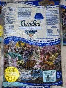 lot 345 image: CaribSea Live Aragonite Reef Sand - Six 10 lb bags