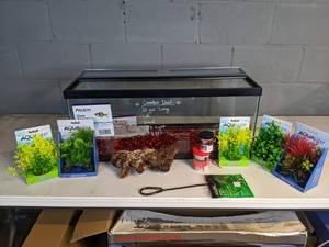 lot 978 image: NEW 20 Gallon Tank with Accessories (Plant Scapes, Omega One Flakes, and more)