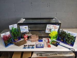 lot 972 image: NEW 20 Gallon Long Tank with Accessories (Plant Scapes, Air Diffusers, Shrimp Net, and more)