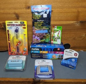 lot 1097 image: New Aquarium Care Supplies & Accessories Aqua Solutions Certifies Calibration, Mag Float Acrylic Cleaner, Fluval Master Kit, & More