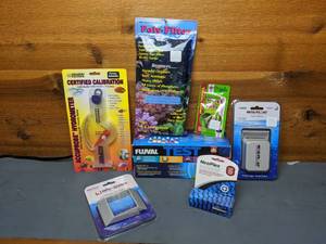 lot 1098 image: New Aquarium Care Supplies & Accessories Aqua Solutions Certifies Calibration, Mag Float Acrylic Cleaner, Fluval Master Kit, & More