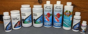 lot 1094 image: New Aquarium Supplements Seachem ParaGuard, Cichlid Lake Salt, Matrix Carbon, Oasis Water Garden Pond Prime, & More