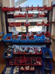 lot 1116 image: Large New Array of Aquarium Filter Pipe Parts w Bins & Rack