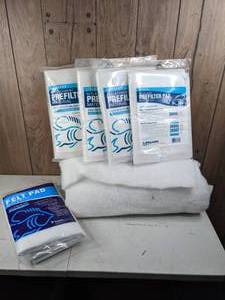 lot 1017 image: Lot of 4 NEW Prefilter Pads, 1 Felt Pad and More